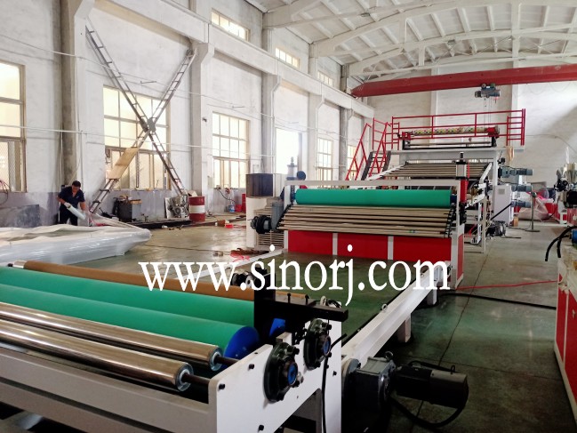 仿大理石板生產(chǎn)線，地板革生產(chǎn)線，三輥四輥集裝箱發(fā)貨中